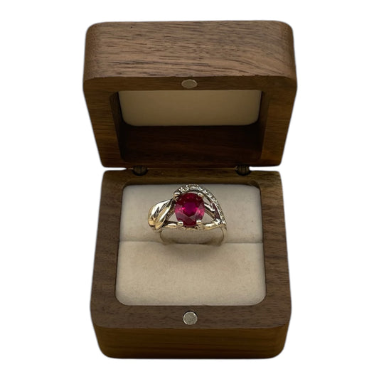 Anillo flor con rubí y zafiros blancos